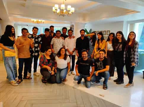 Yellow Slice studio interior with team members - Yellow Slice